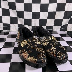 Tom’s black floral flats